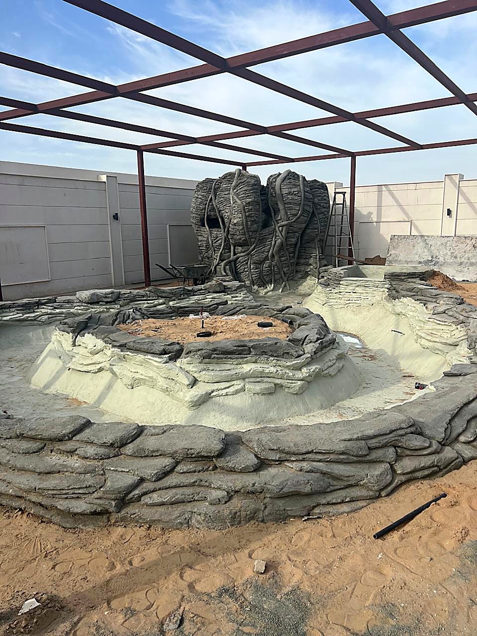 Sculpted rock water feature under construction